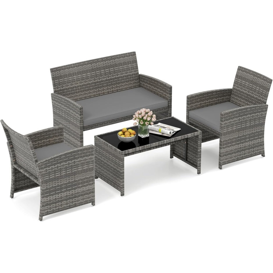 Ensemble de jardin quatre pieces avec structure en resine tressee et table basse en verre trempe