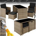 Mobilier de jardin quatre places en resine tressee avec fauteuils, poufs, table et coussins
