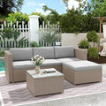 Salon de jardin en resine tressee avec coussins et table en verre pour trois a quatre personnes