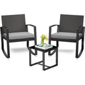 Salon de jardin trois pieces avec deux fauteuils a bascule, table basse et coussins en resine tressee grise